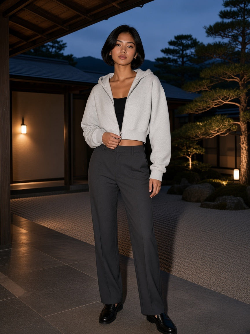 Marcel Afters Essential Cropped Zip-Up Hoodie in Oat Gray, worn by a woman, outdoor