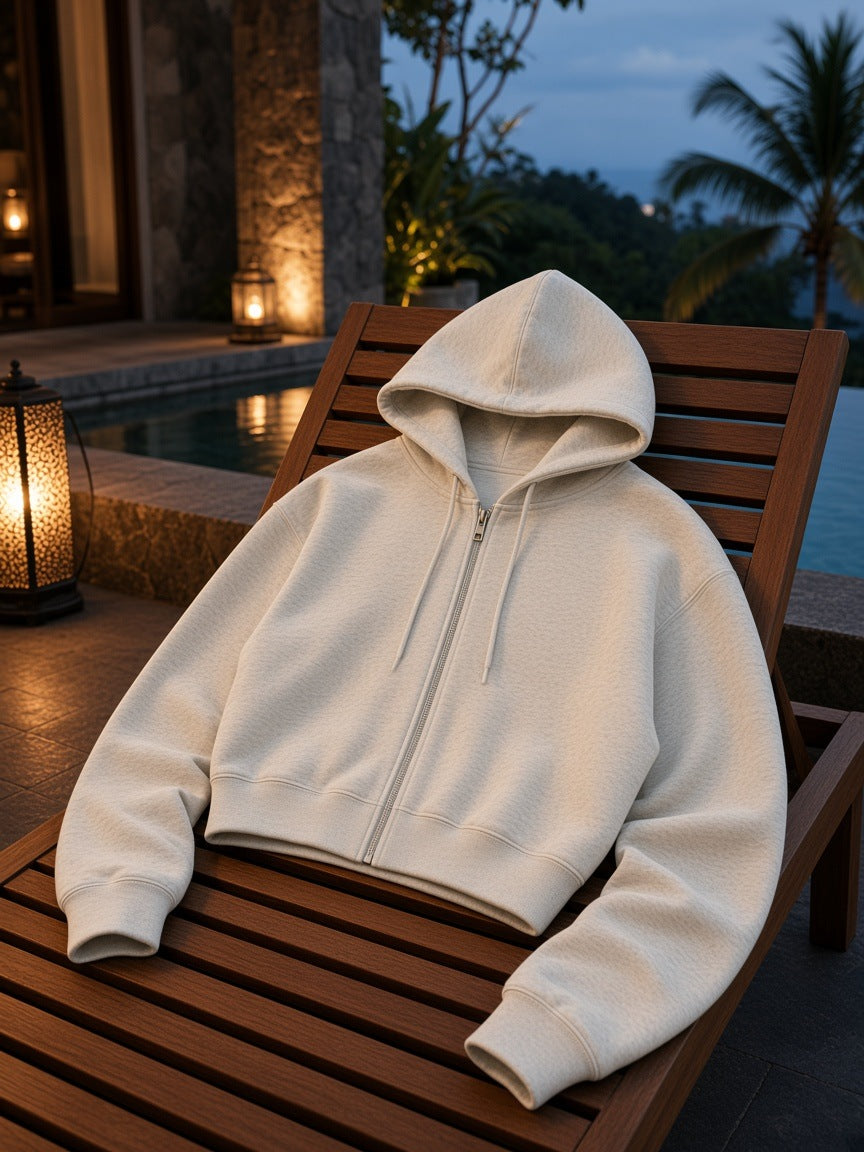 Marcel Afters Essential Cropped Zip-Up Hoodie in Oat Gray, laid flat, outdoor