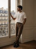 Model wearing the Essential Half Sleeve Ribbed T-Shirt in White, full-length model photo