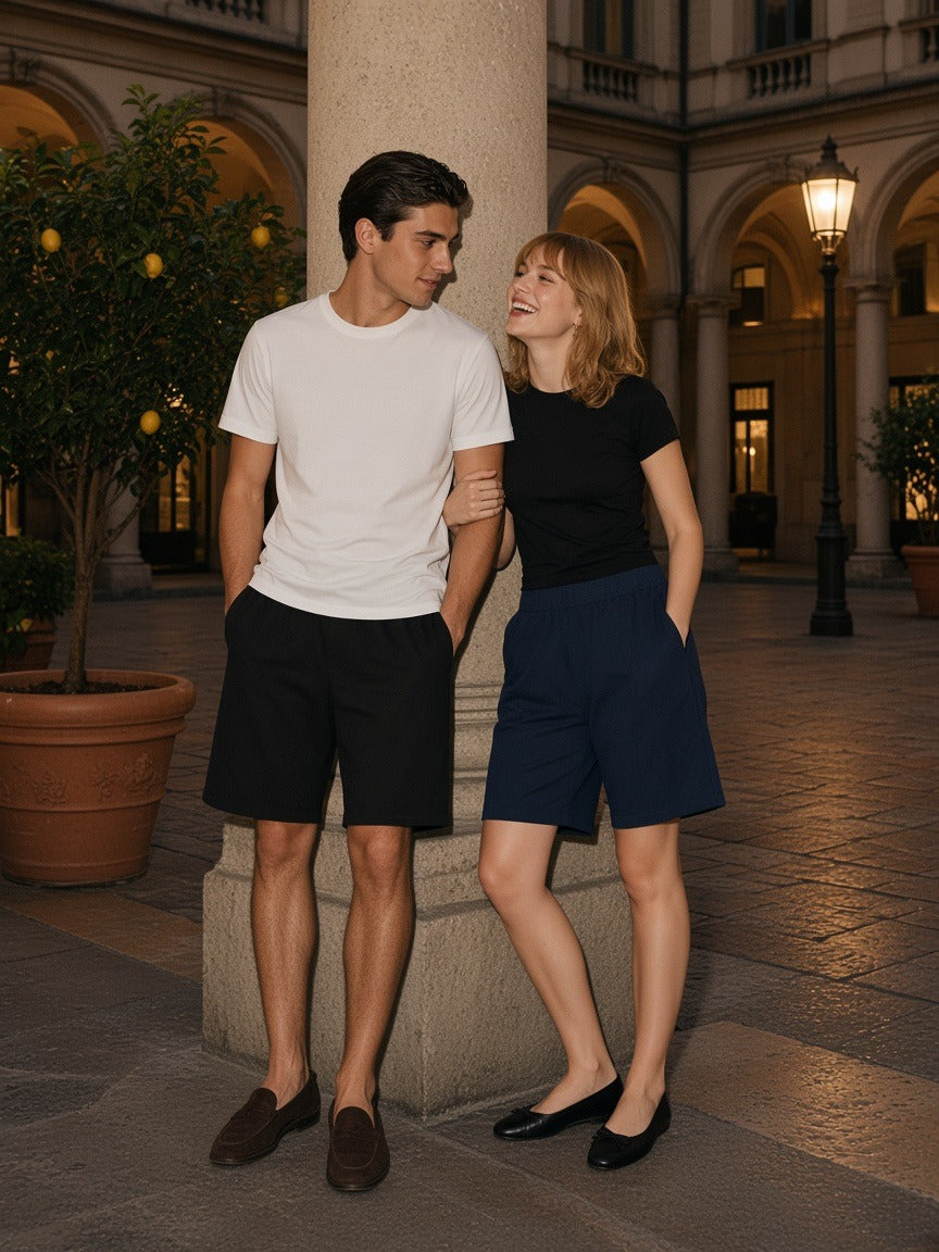Two people wearing the Essential Heavyweight Cotton Shorts in Black and Navy Blue, full-length model photo