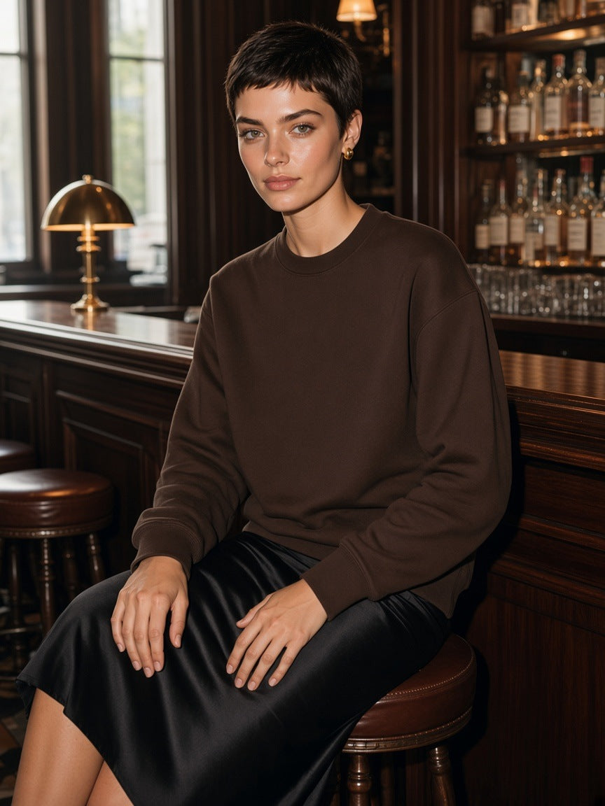 Marcel Afters Essential Heavyweight Cotton Sweatshirt in Coffee, worn by a woman, bar