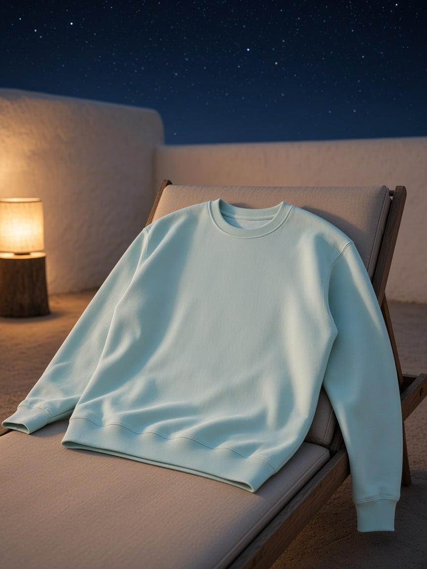 Marcel Afters Essential Heavyweight Crewneck Sweatshirt, 400 gsm in Water Blue, laid flat, desert