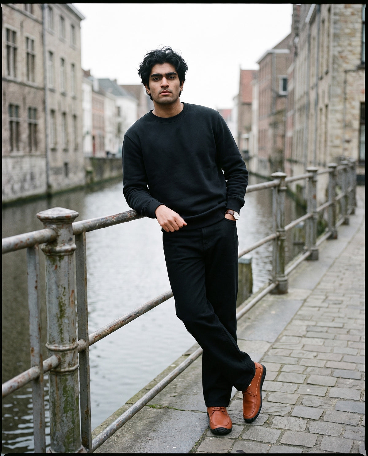Man wearing the Marcel Afters Essential Heavyweight Crewneck Sweatshirt, 400 gsm, Dark Tones in Black, full-length editorial photograph