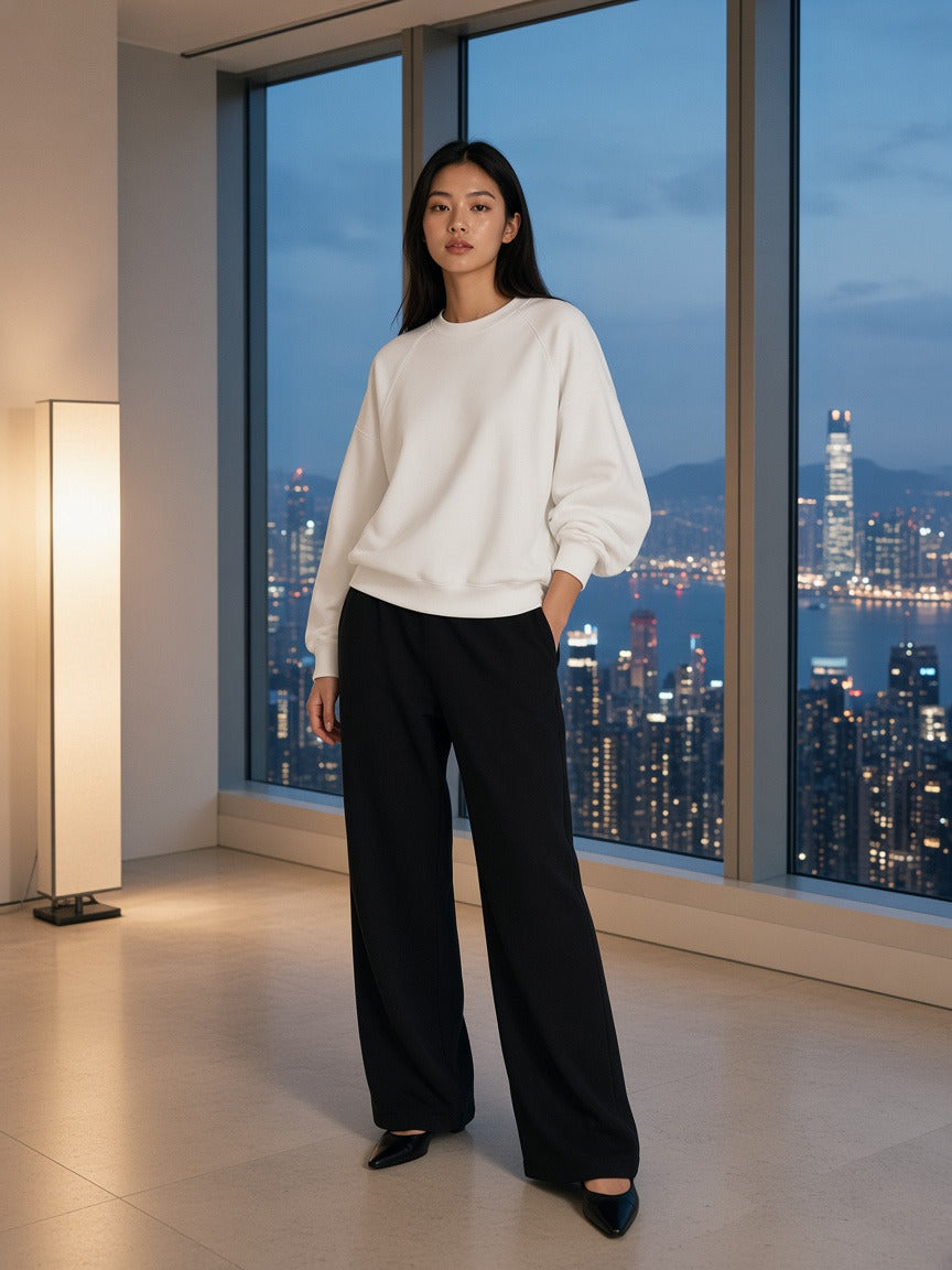 Model wearing the Essential Heavyweight Dolman Sleeve Boxy Sweatshirt in White, full-length model photo