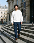 Man wearing the Essential Heavyweight Dolman Sleeve Boxy Sweatshirt in White, full-length model photo