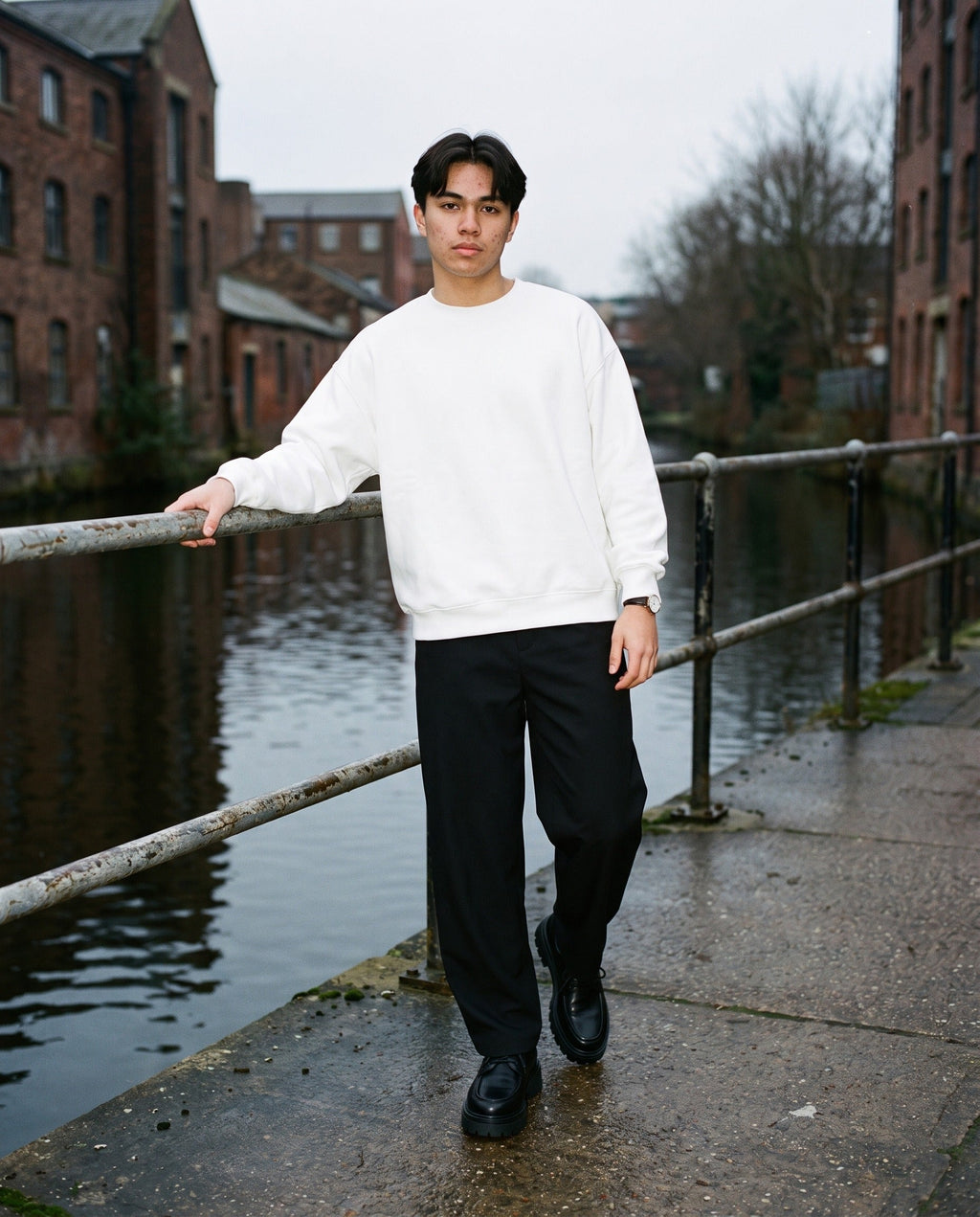 Man wearing the Essential Heavyweight Dolman Sleeve Boxy Sweatshirt in White, full-length model photo