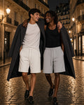 Two people wearing the Essential Heavyweight Fleece Shorts in White and Flower Gray, full-length model photo