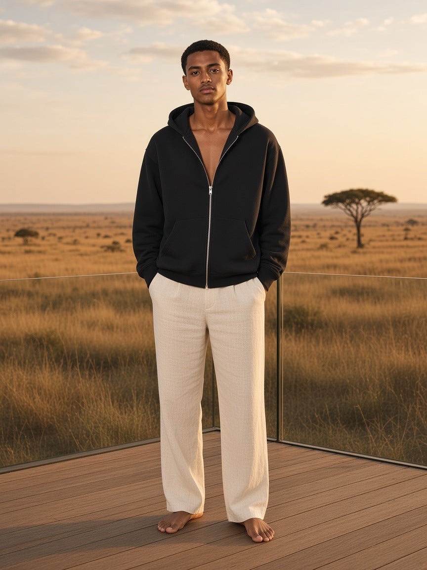 Marcel Afters Essential Heavyweight Pocket Hoodie in Black, worn by a man, desert