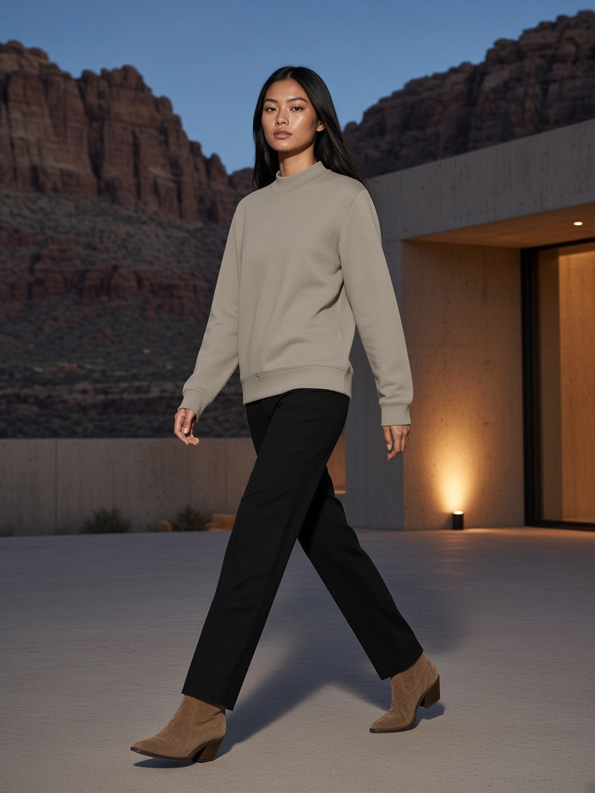 Marcel Afters Essential Non-Shrink Mock Neck Sweatshirt in Light Apricot, worn by a woman, desert