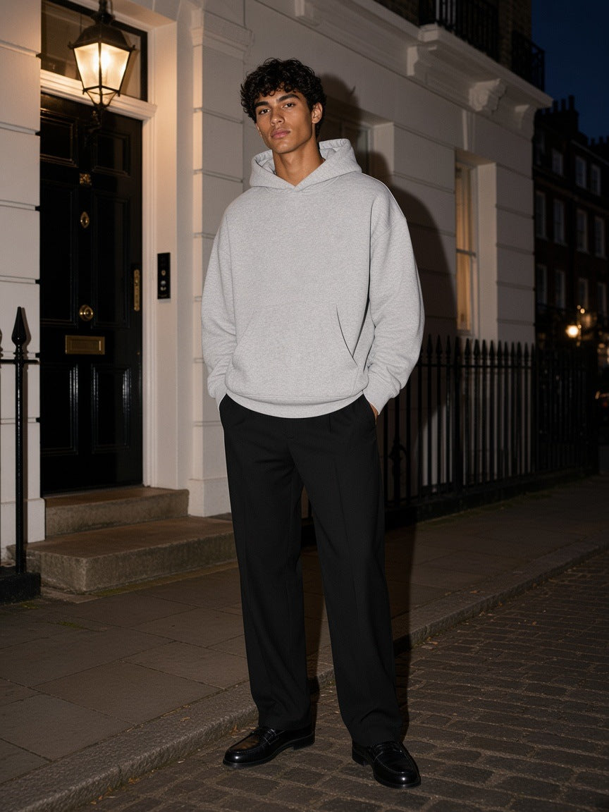 Marcel Afters Essential Oversized Boxy Fit Fleece Hoodie in Grey, worn by a man, street