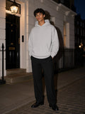 Marcel Afters Essential Oversized Boxy Fit Fleece Hoodie in Grey, worn by a man, street