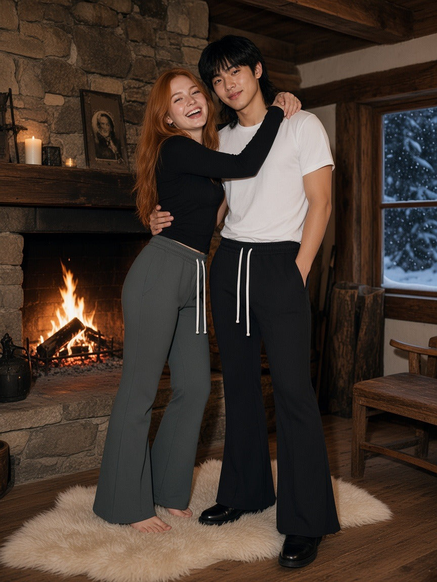 Two people wearing the Flared Sweatpants in Gray and Black, full-length model photo