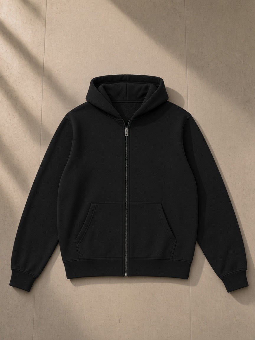 Fleece Full Zip Hoodie in Black, laid flat on pale limestone, front view