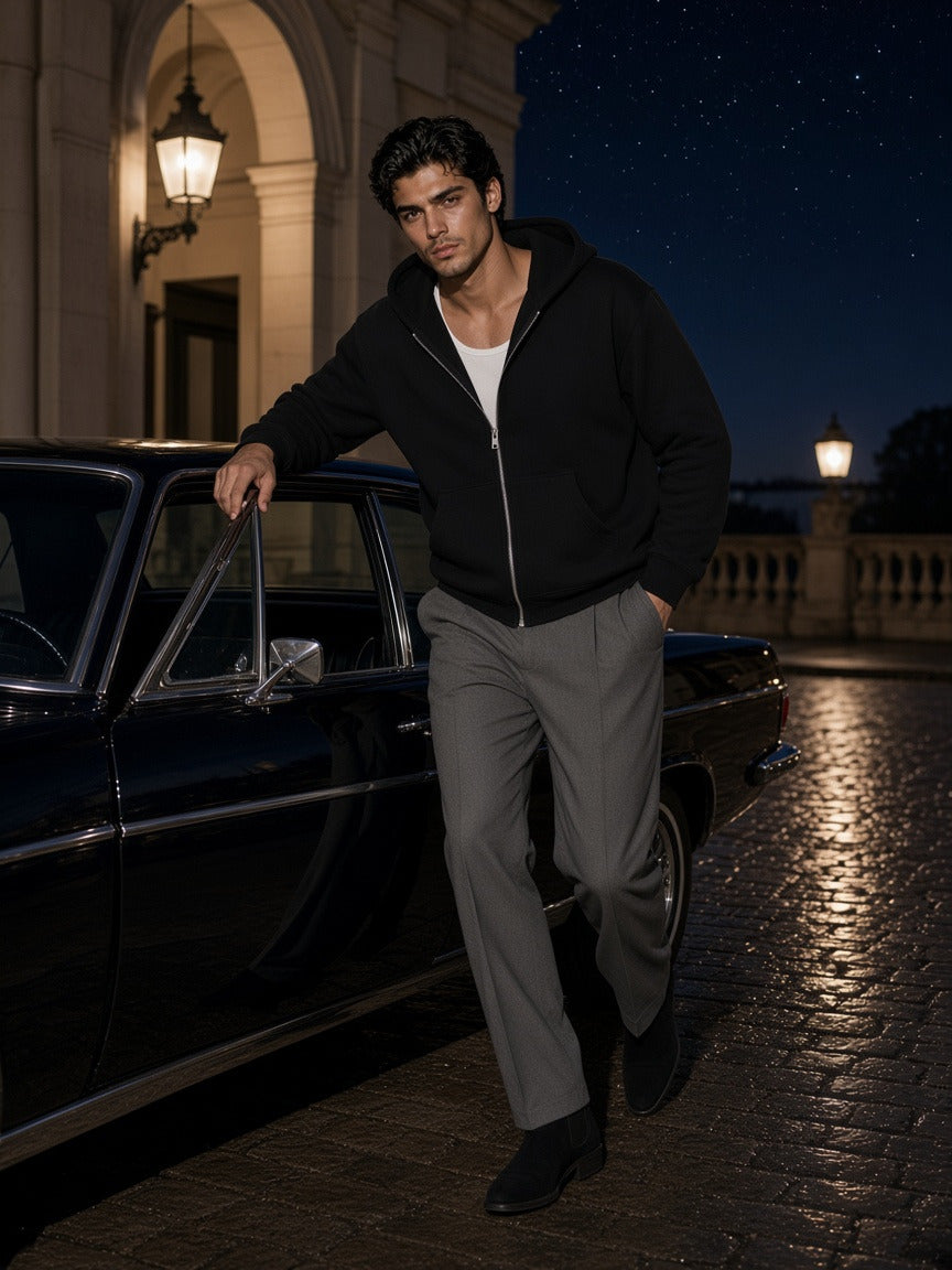 Man wearing the Fleeced Full-Zip Boxy Hoodie in Black, full-length model photo