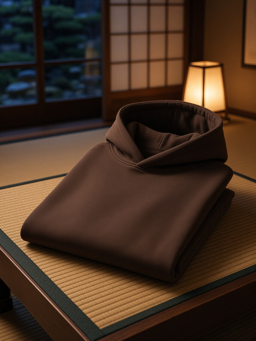 Marcel Afters Fleeced High Neck Hoodie in Brown, laid flat, japanese room