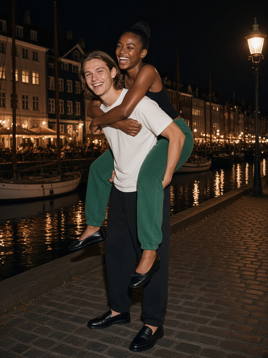 Marcel Afters Fleeced Jogger Sweatpants in Green, worn by a woman, city