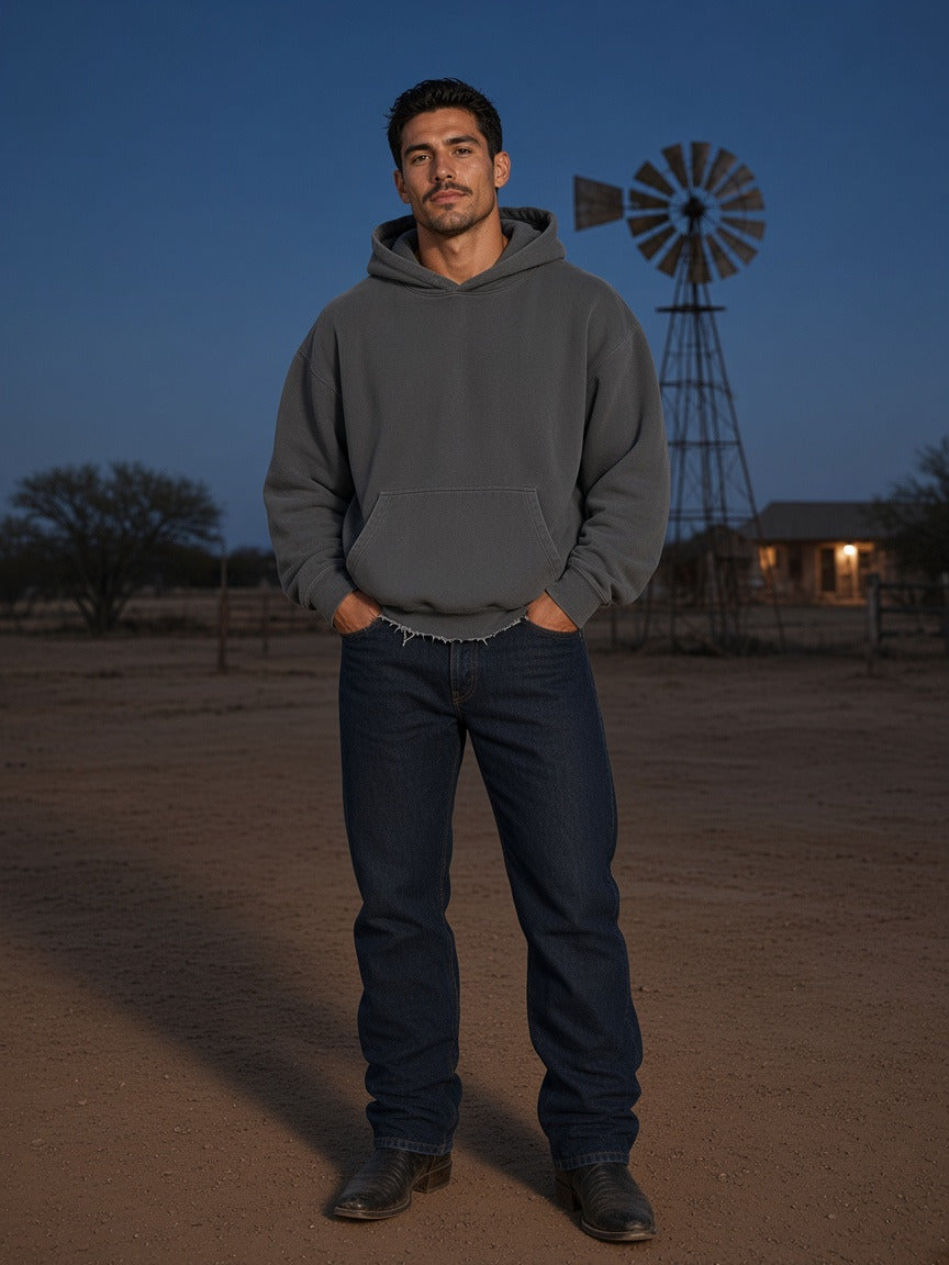 Model wearing the Frayed Enzyme Washed Fleece Hoodie in Dark Gray, full-length model photo
