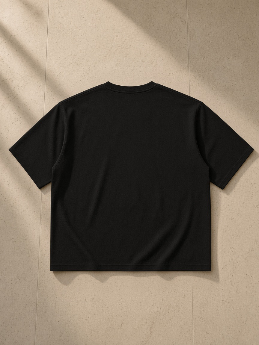 Back of the Black Men's Heavyweight Boxy T-Shirt, laid flat