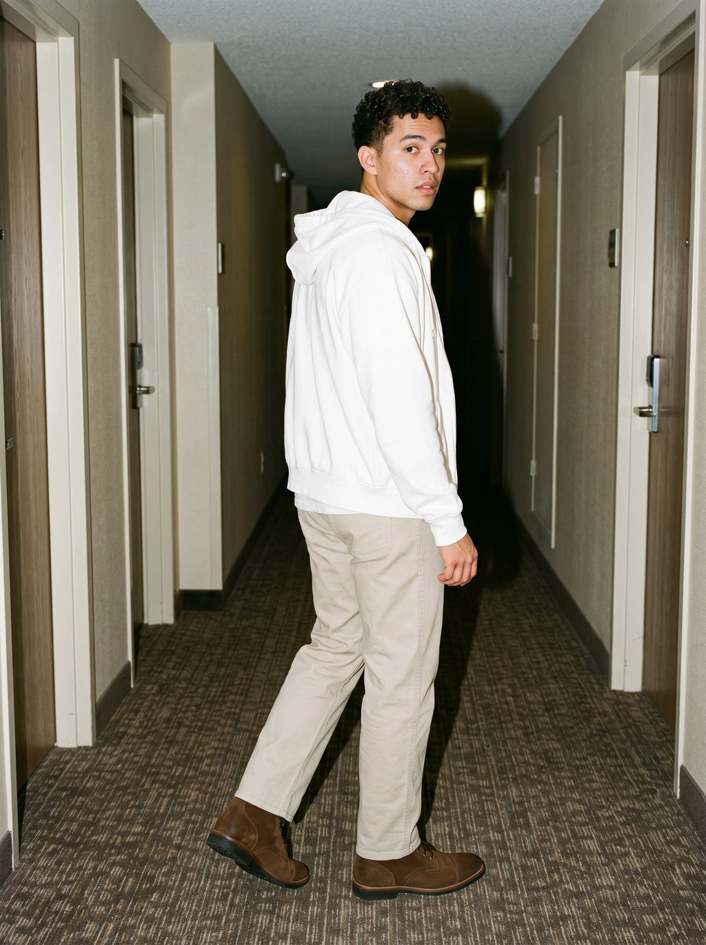 Man wearing the Heavyweight Cotton Straight-Leg Pants in Pale Khaki, full-length model photo