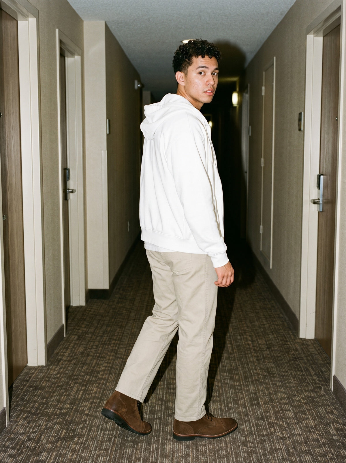 Man wearing the Heavyweight Cotton Straight-Leg Pants in Pale Khaki, full-length model photo