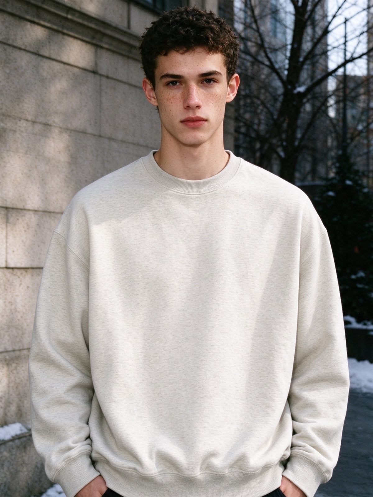 Man wearing the Marcel Afters Heavyweight Crewneck Sweatshirt, Light Tones, full-length editorial photograph