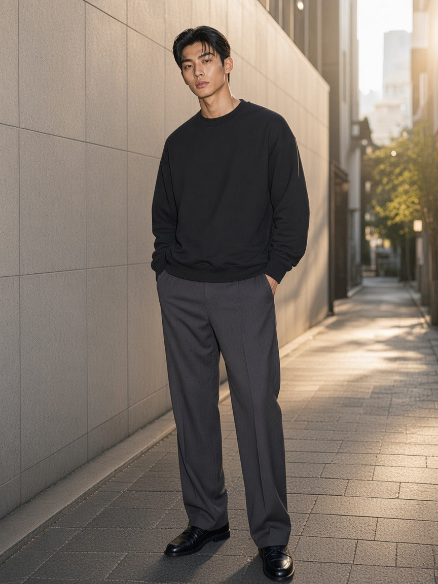 Model wearing the Heavyweight Drop Shoulder Sweatshirt in Black Beauty, full-length model photo