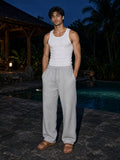 Man wearing the Heavyweight Fleece Sweatpants in Flower Gray, full-length model photo