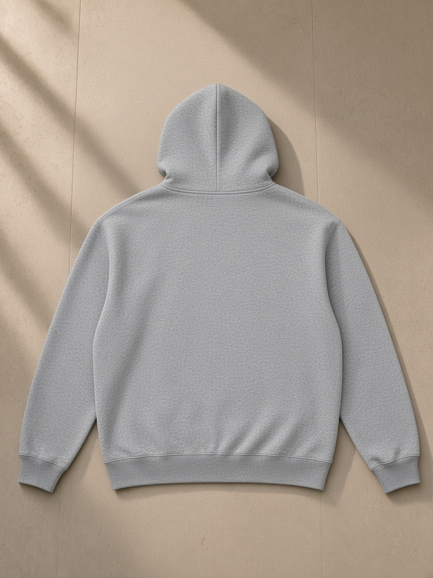 Heavyweight full-zip hoodie in Flower Gray, laid flat on pale limestone, back view