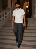 Marcel Afters Heavyweight Hand-frayed T-Shirt in White, worn by a man, staircase