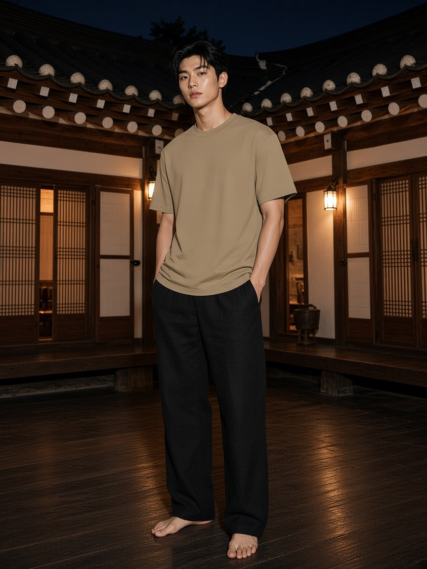 Model wearing the Heavyweight Hand-frayed T-Shirt in Camel, full-length model photo