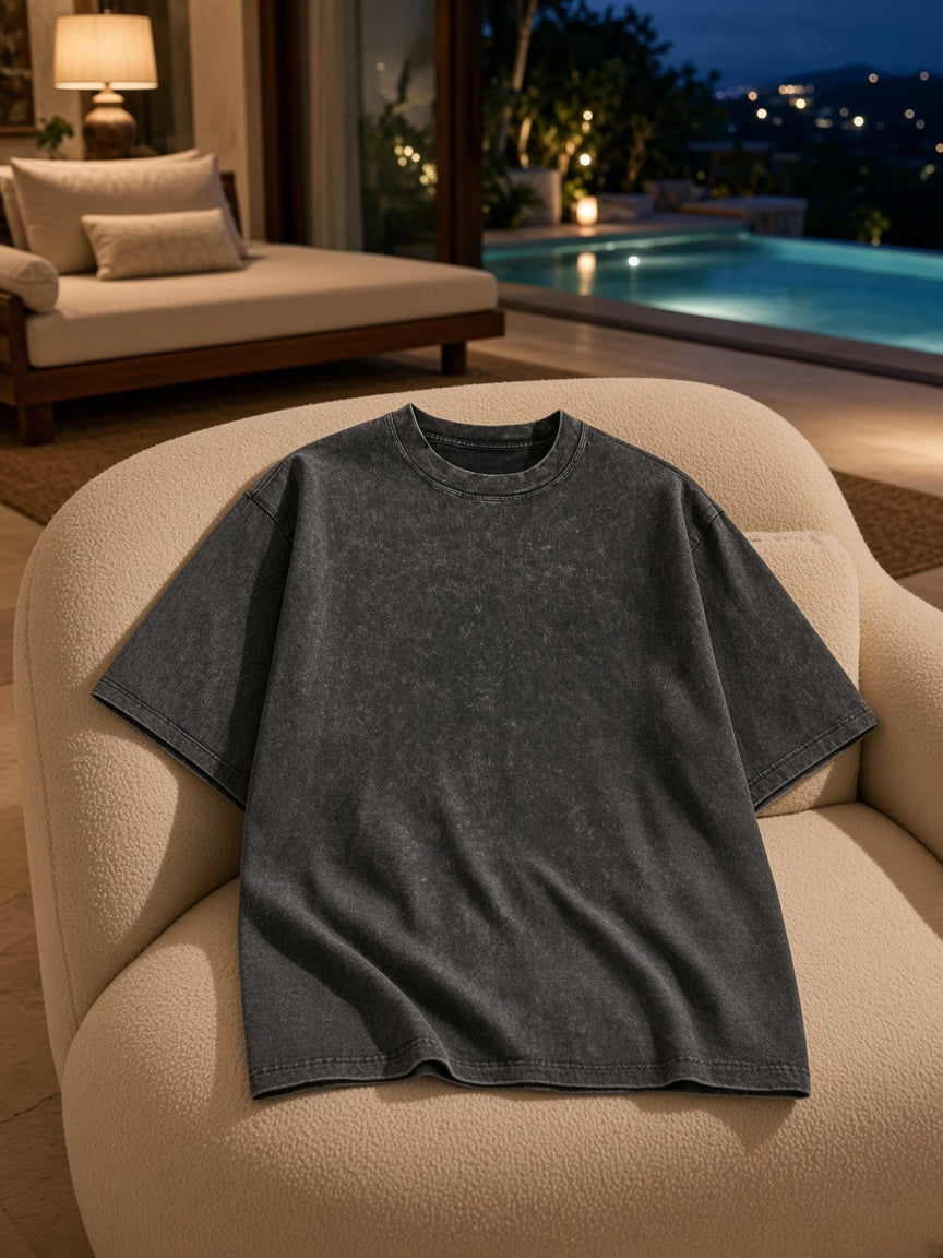 Marcel Afters Heavyweight Snow Washed T-Shirt in Dark Gray, laid flat, living room