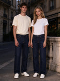 Two people wearing the Heavyweight Straight-Leg Denim Jeans in Navy Blue, full-length model photo