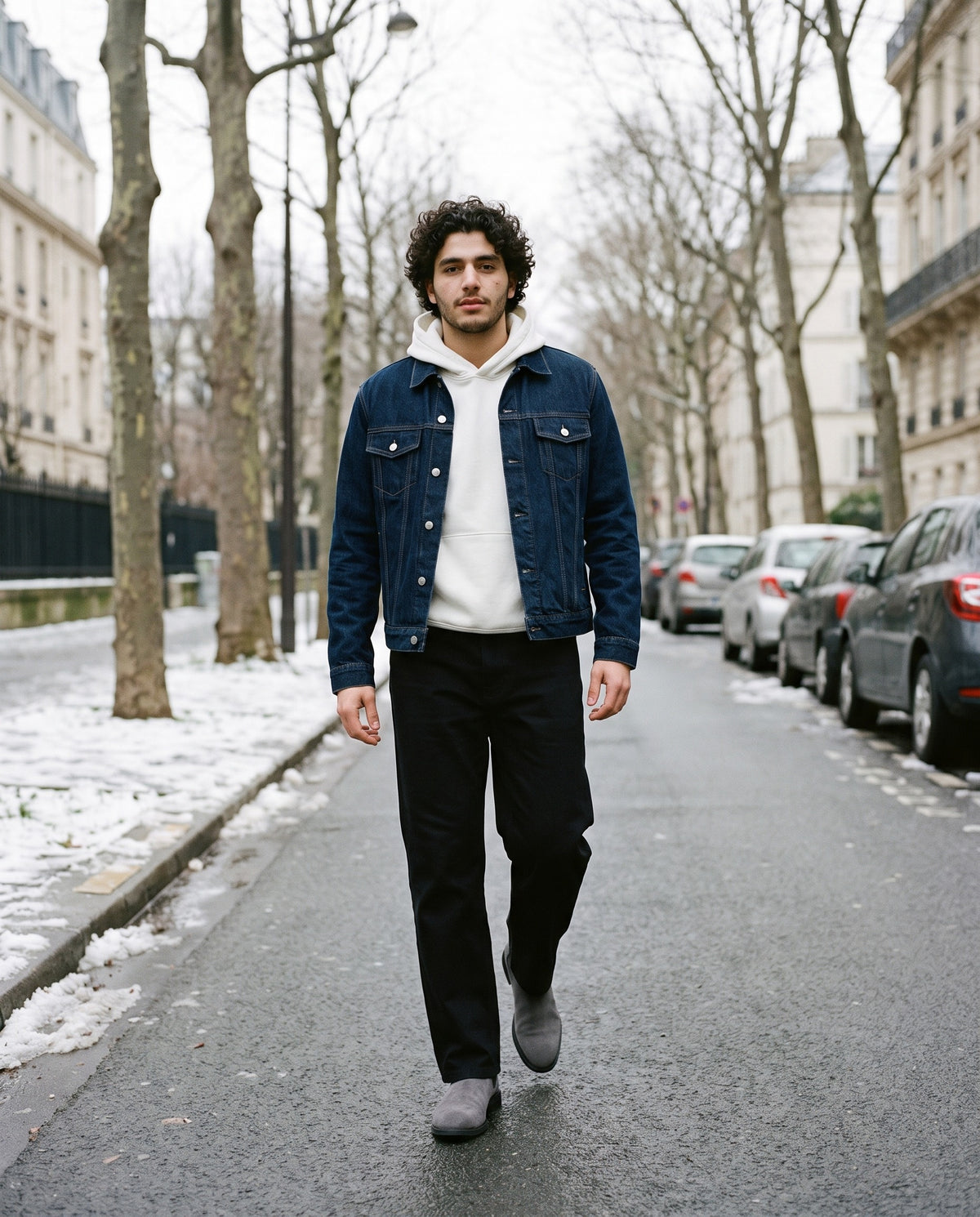 Man wearing the Marcel Afters Heavyweight Straight-Leg Trousers in Black, full-length editorial photograph
