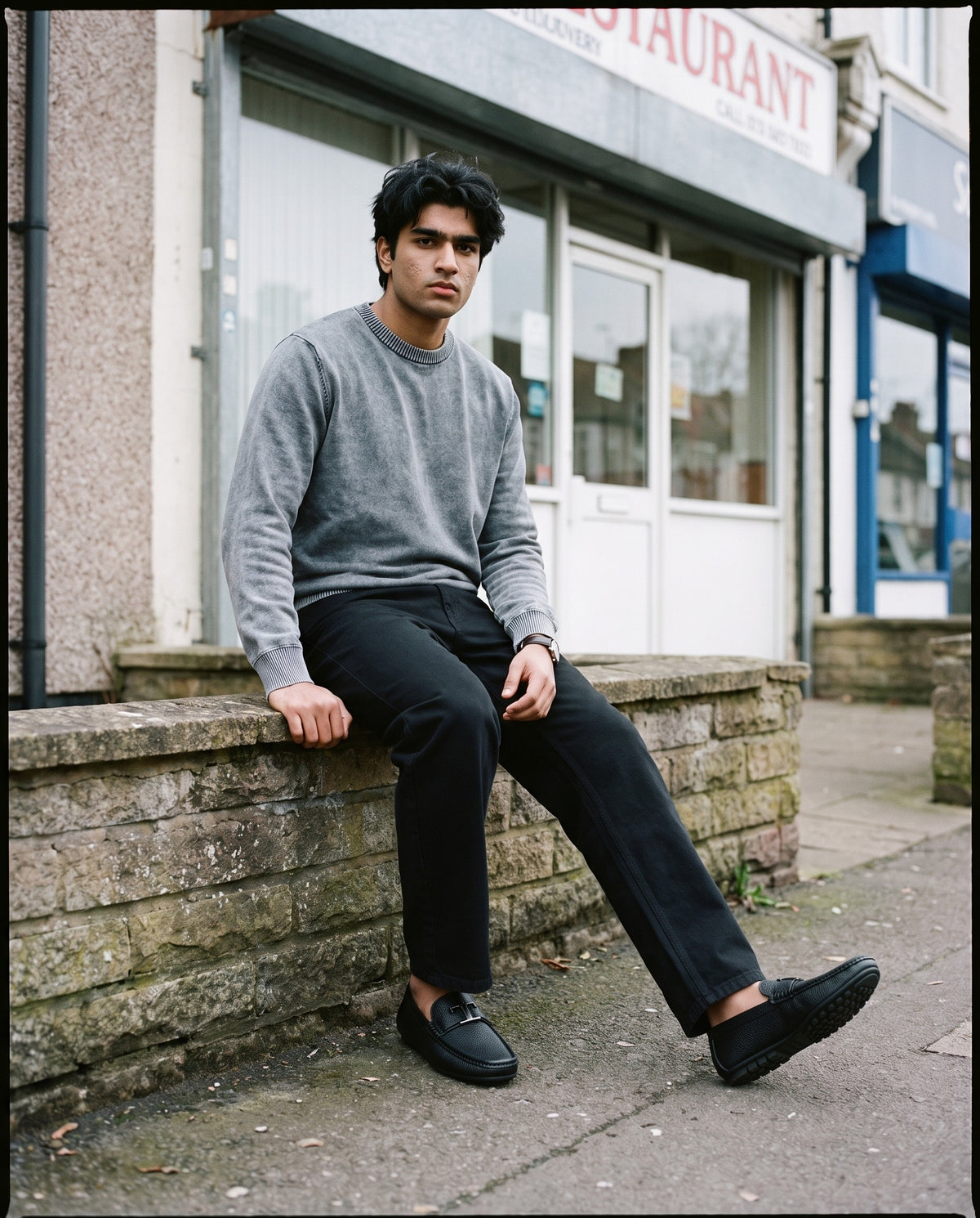 Man wearing the Marcel Afters Heavyweight Straight-Leg Trousers in Black, full-length editorial photograph