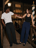 Marcel Afters Heavyweight Wide Leg Panel Sweatpants in Black, worn by a man, venice