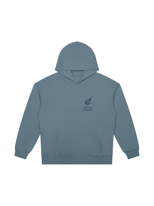 Last Call heavyweight pullover hoodie in Gray Blue, front view with a disco ball on a cocktail pick on the left chest. Marcel Afters.