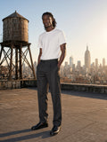 Man wearing the Lightweight Crewneck T-Shirt in White, full-length model photo