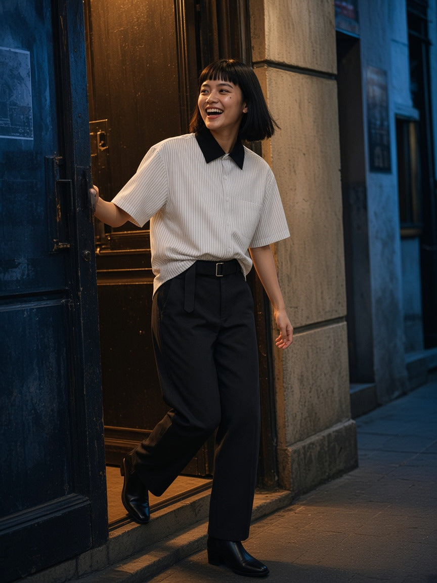 Part of the look Side Door: woman in a white striped boxy contrast-collar shirt and black belted barrel-leg chinos