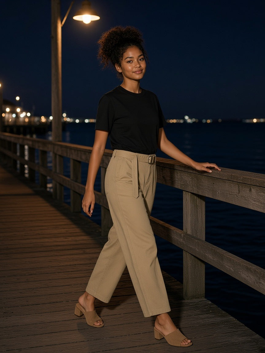 Part of the look Tonic: woman in a black crewneck knit tee and khaki belted barrel-leg chinos