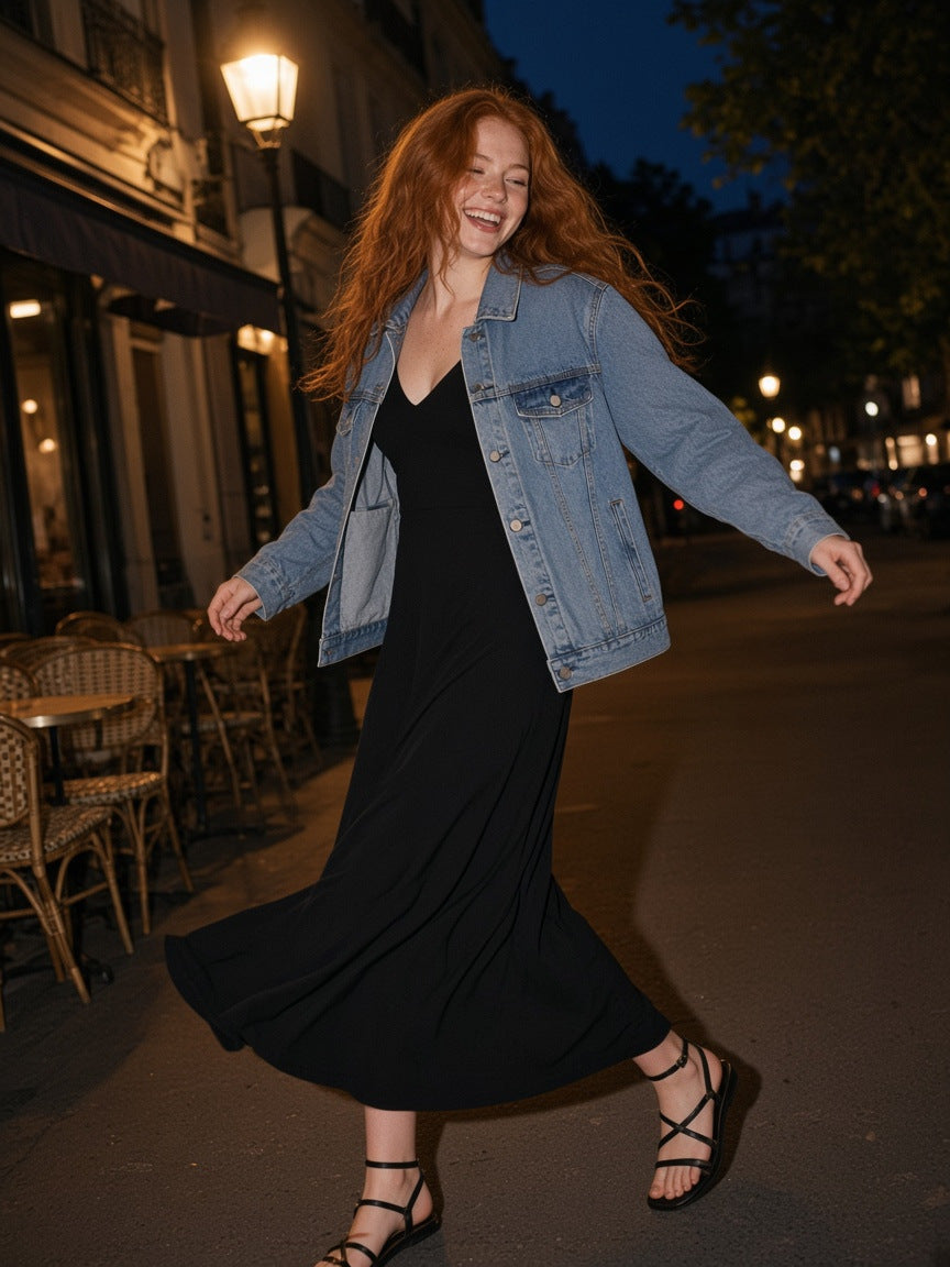 Part of the look Two A.M. Waltz: woman in a black V-neck maxi dress under a blue vintage-wash denim jacket