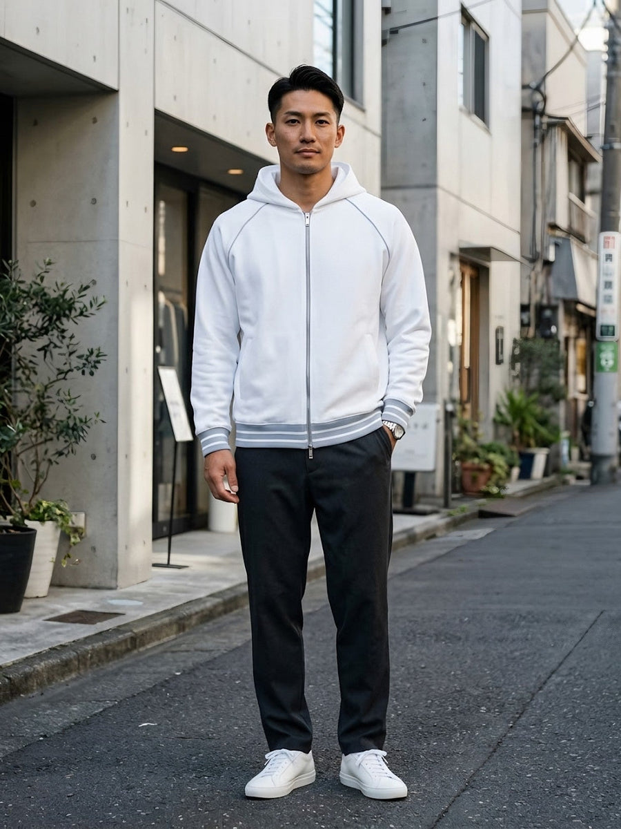 Man wearing the Men's Striped Trim Zip-Up Hoodie in White, full-length model photo