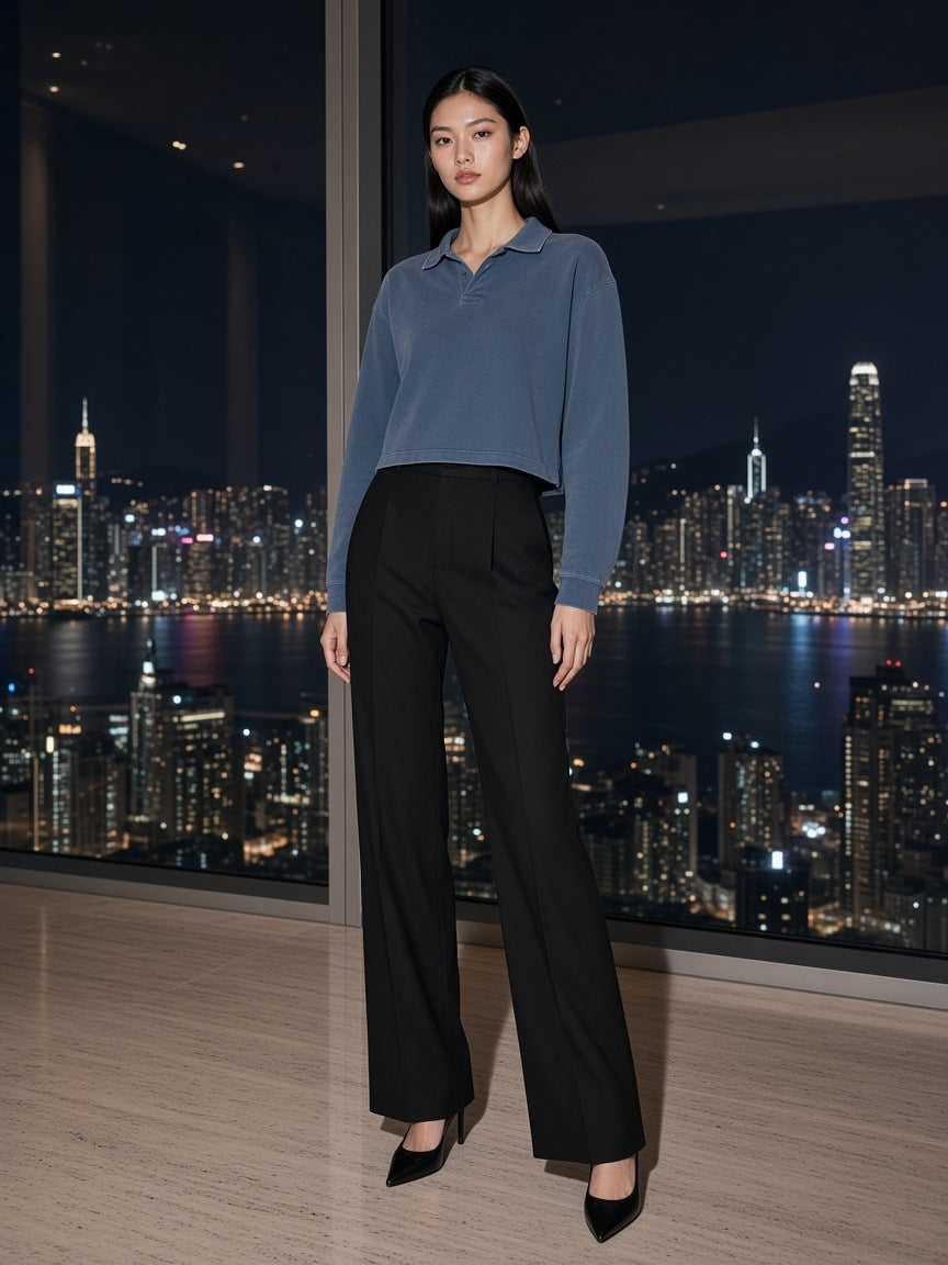 Marcel Afters Mineral Wash Pullover Sweatshirt in Blue, worn by a woman, city