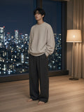 Model wearing the Oversized Drop Shoulder Crewneck Sweatshirt in Oat Gray, full-length model photo