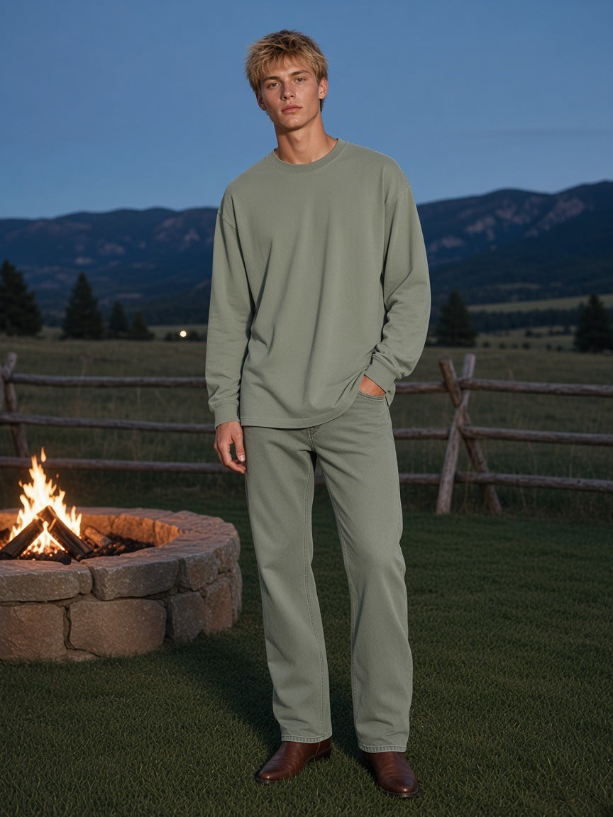 Marcel Afters Oversized Long Sleeve T-Shirt in Gray Green, worn by a man, field