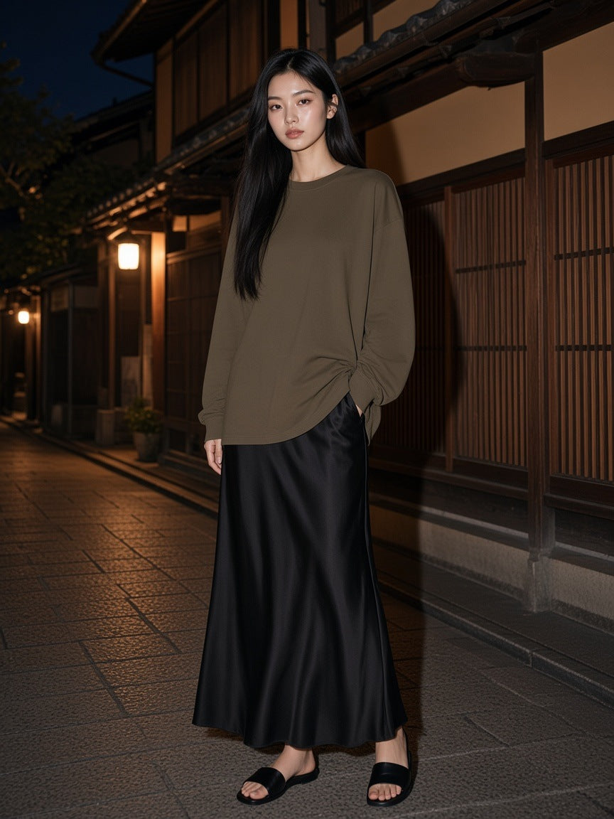 Marcel Afters Oversized Long Sleeve T-Shirt in Brown, worn by a woman, street