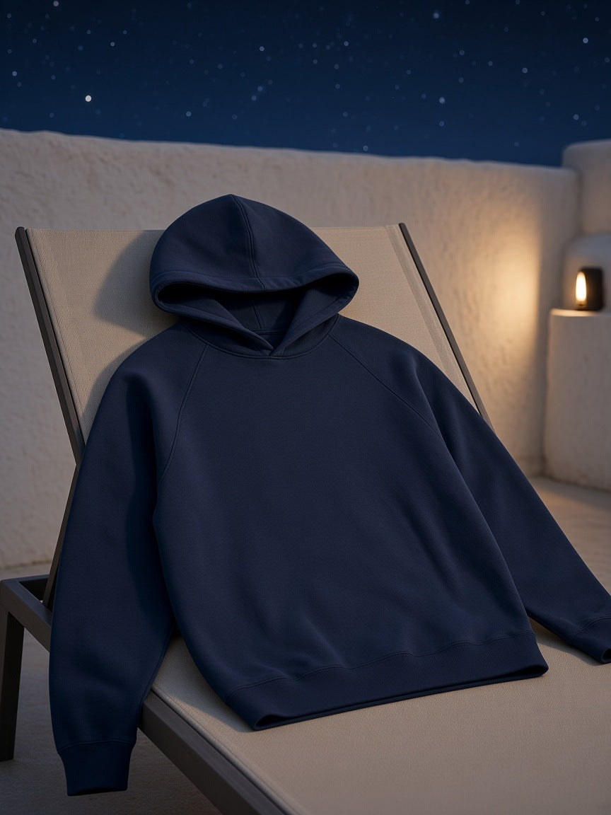 Marcel Afters Oversized Raglan Pullover Hoodie in Navy Blue, laid flat, night