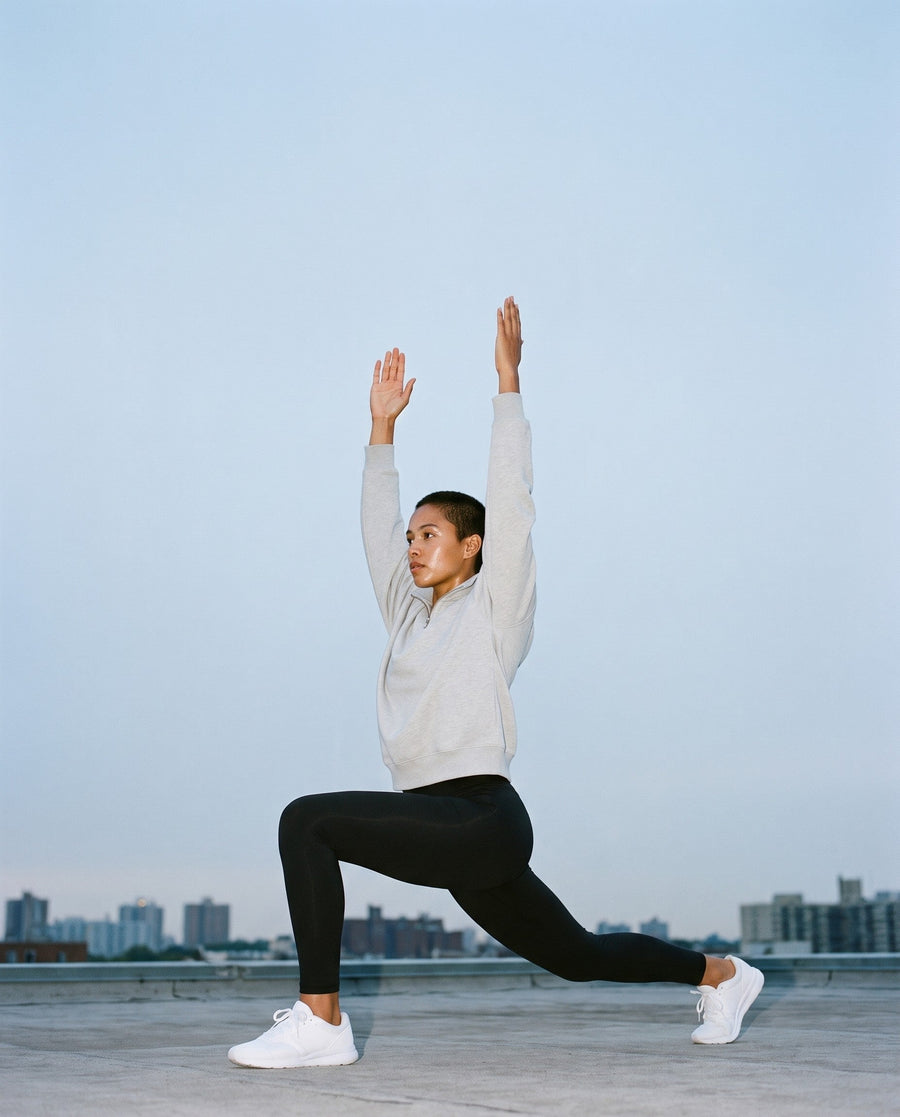 Woman wearing the Quarter-Zip Drop Shoulder Sweatshirt in Flower Gray, full-length model photo