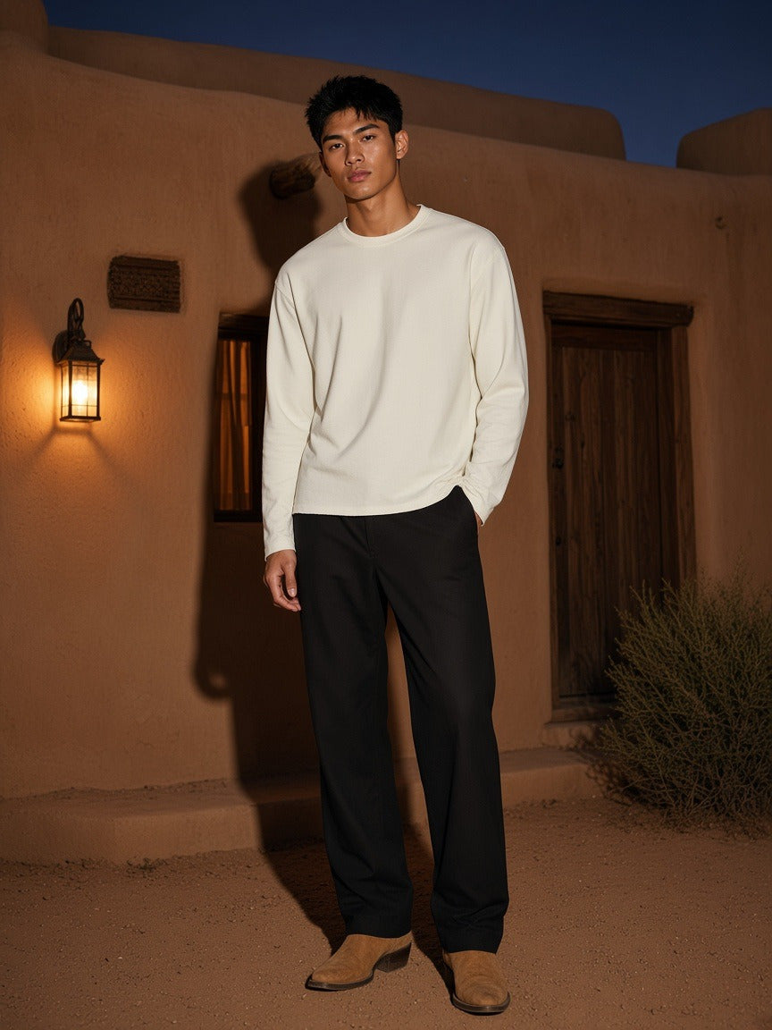 Model wearing the Raw Edge Long Sleeve T-Shirt in White, full-length model photo