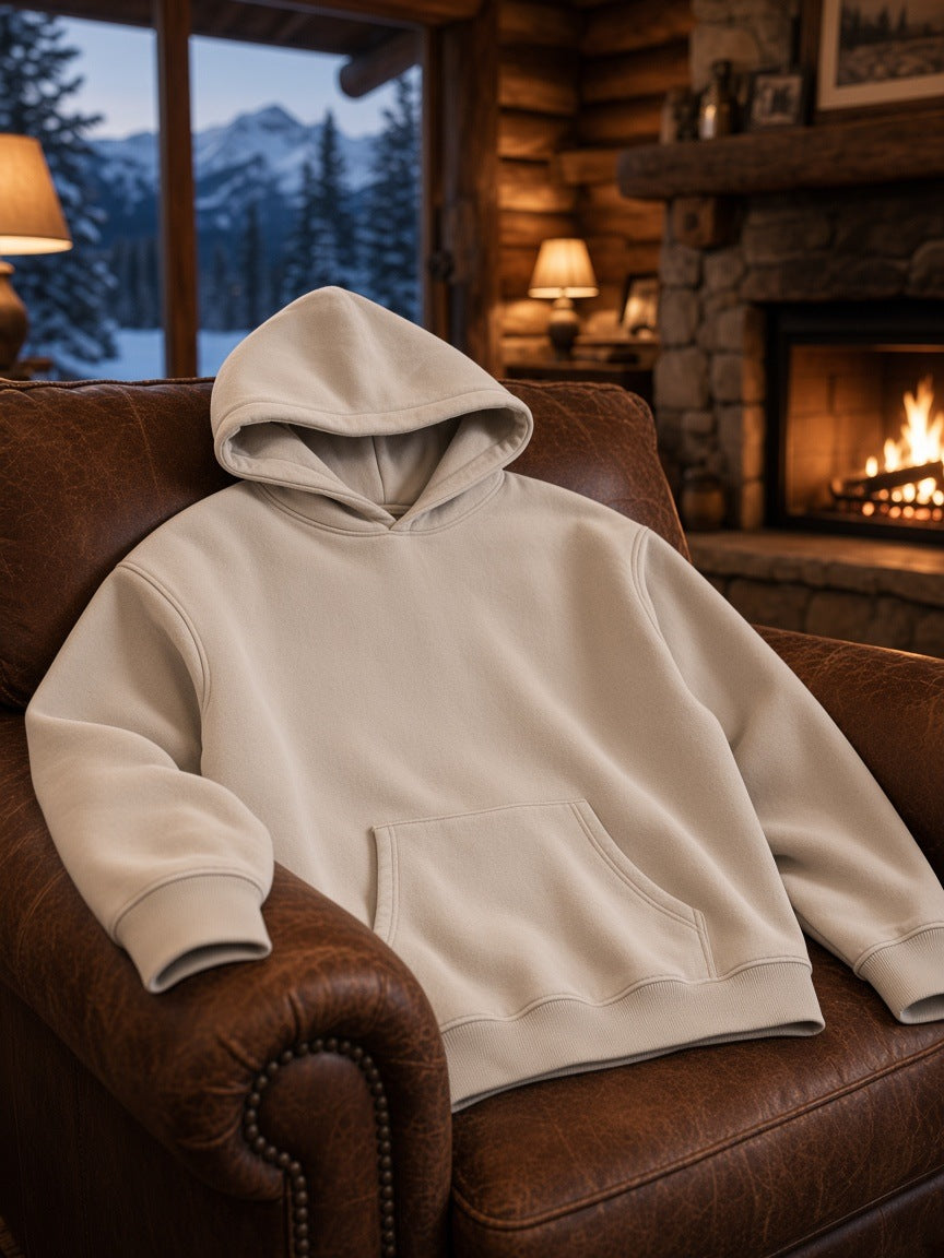 Marcel Afters Snow Wash Fleece Oversize Hoodie in Mild Apricot, laid flat, wood-paneled room