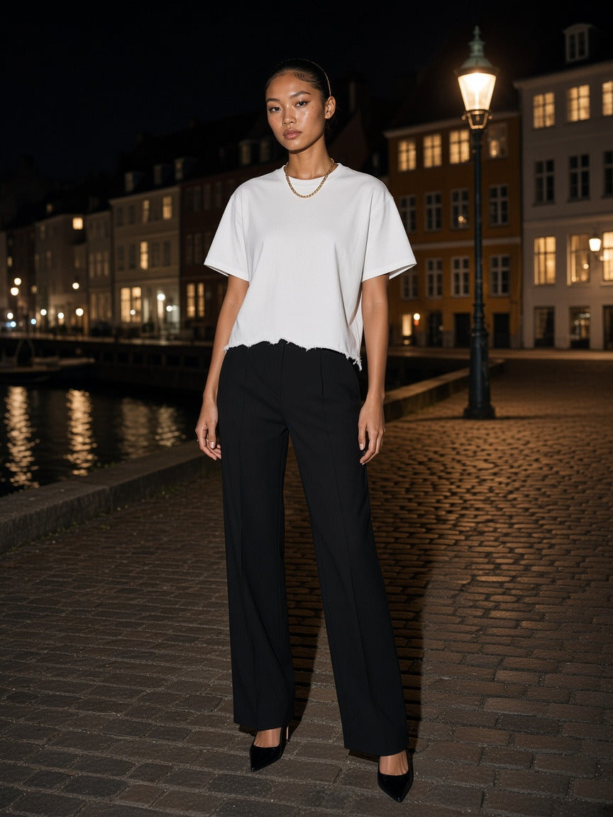 Model wearing the Snow Wash Raw-Hem Boxy T-shirt in Washed White, full-length model photo